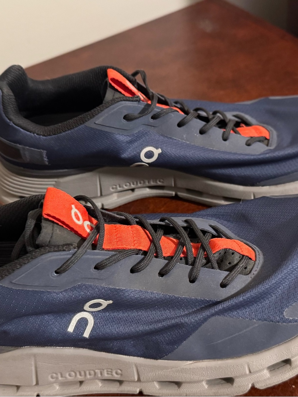 On Running Navy and Orange Running Shoe